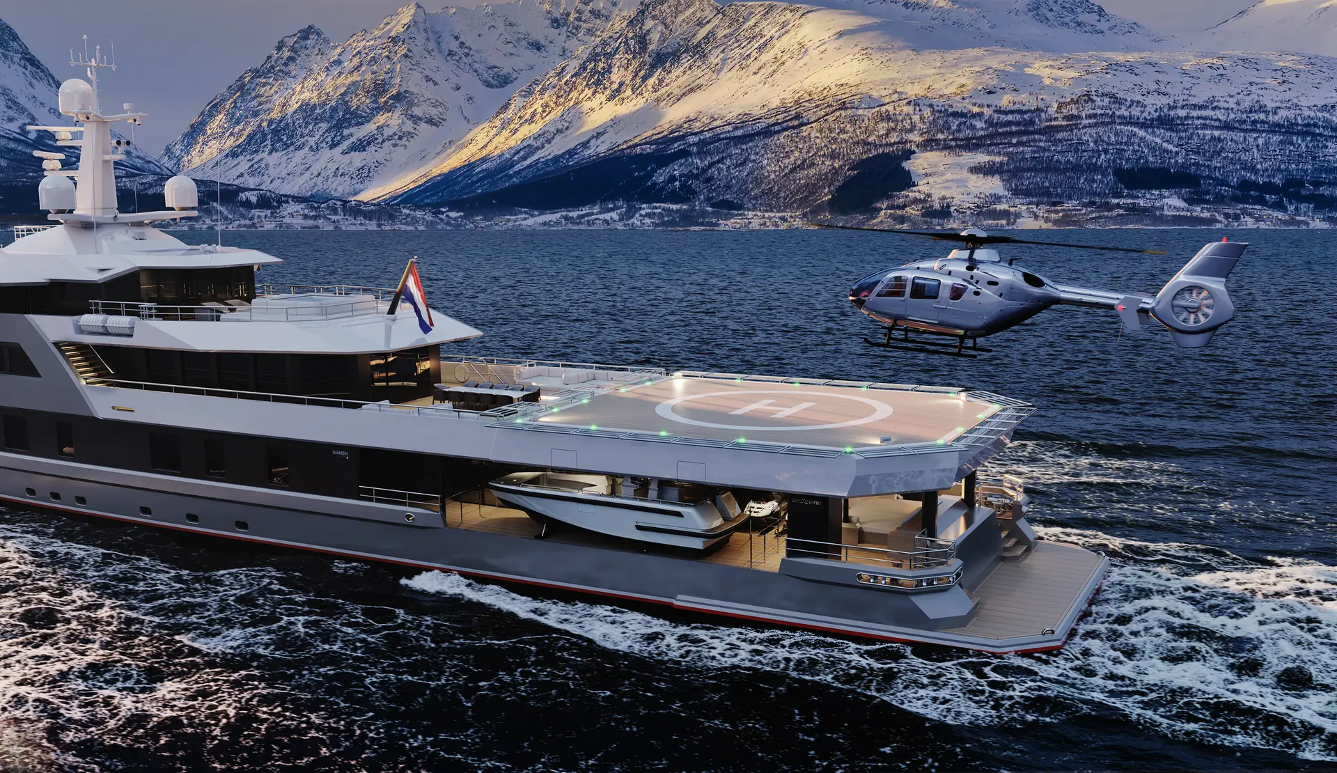 Side profile of AFTER YOU beneath snow-covered mountains with a helicopter on approach to the aft helideck