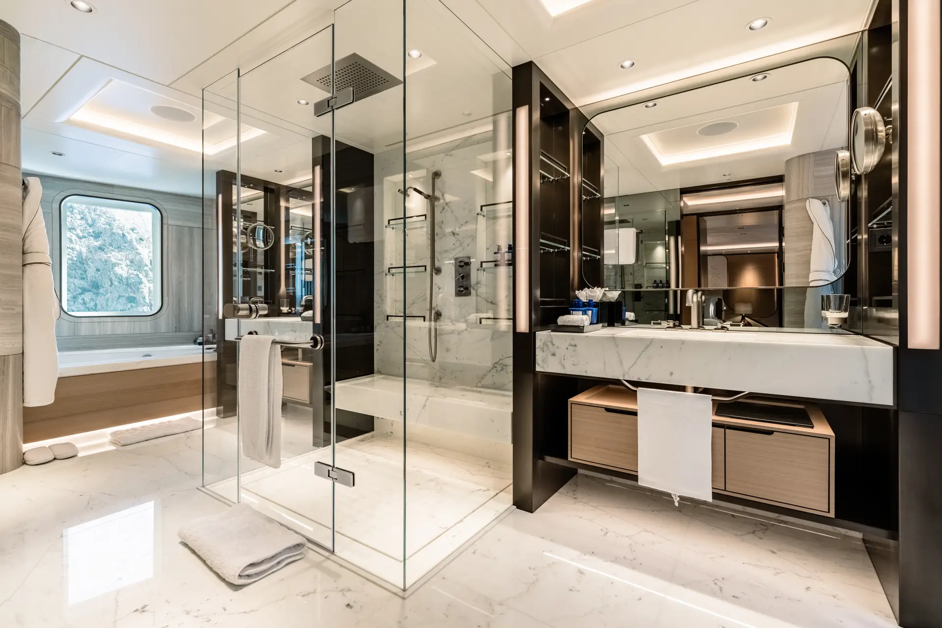 Bathroom in restrained stone with a timber vanity